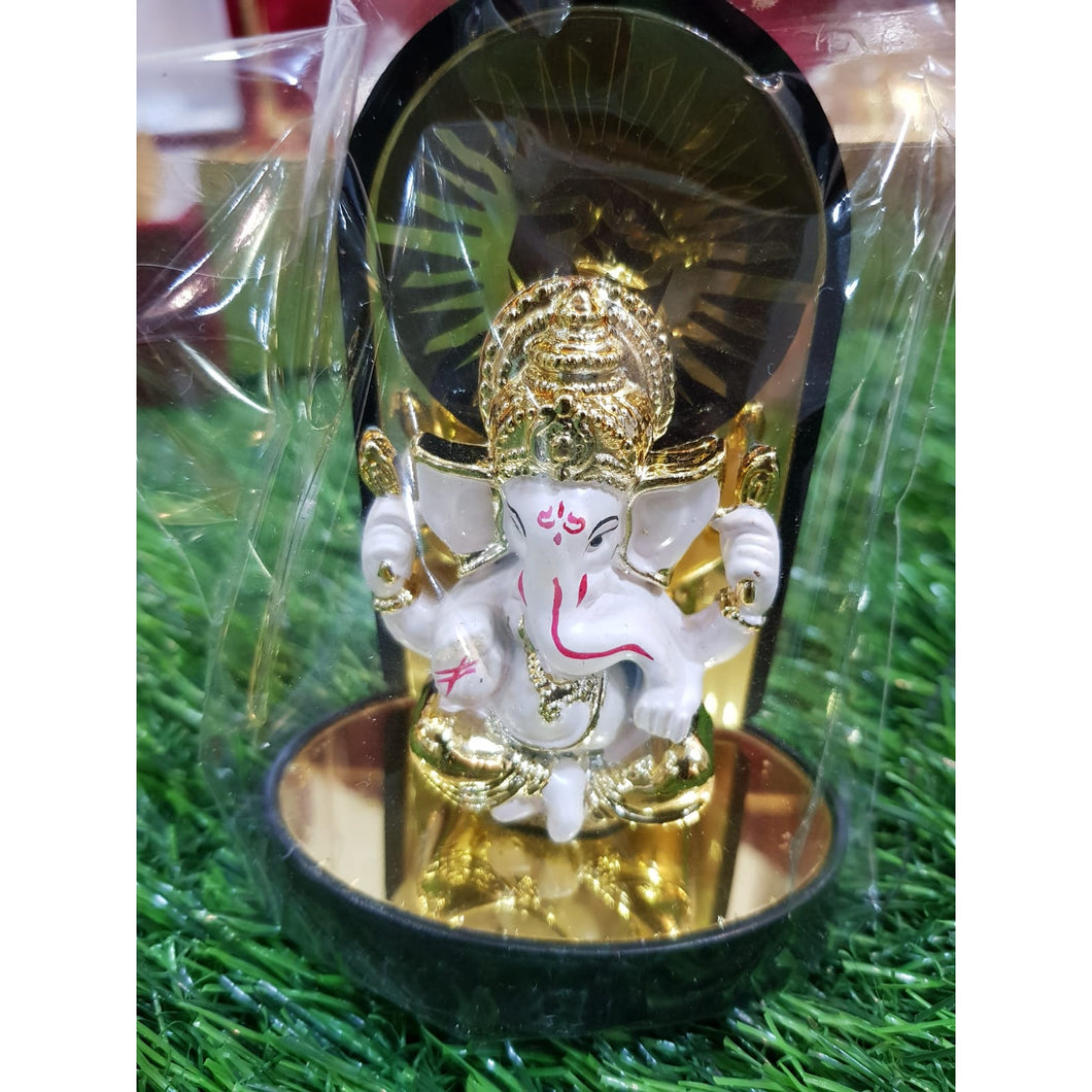 Gold and white Ganesha with wood and metal base