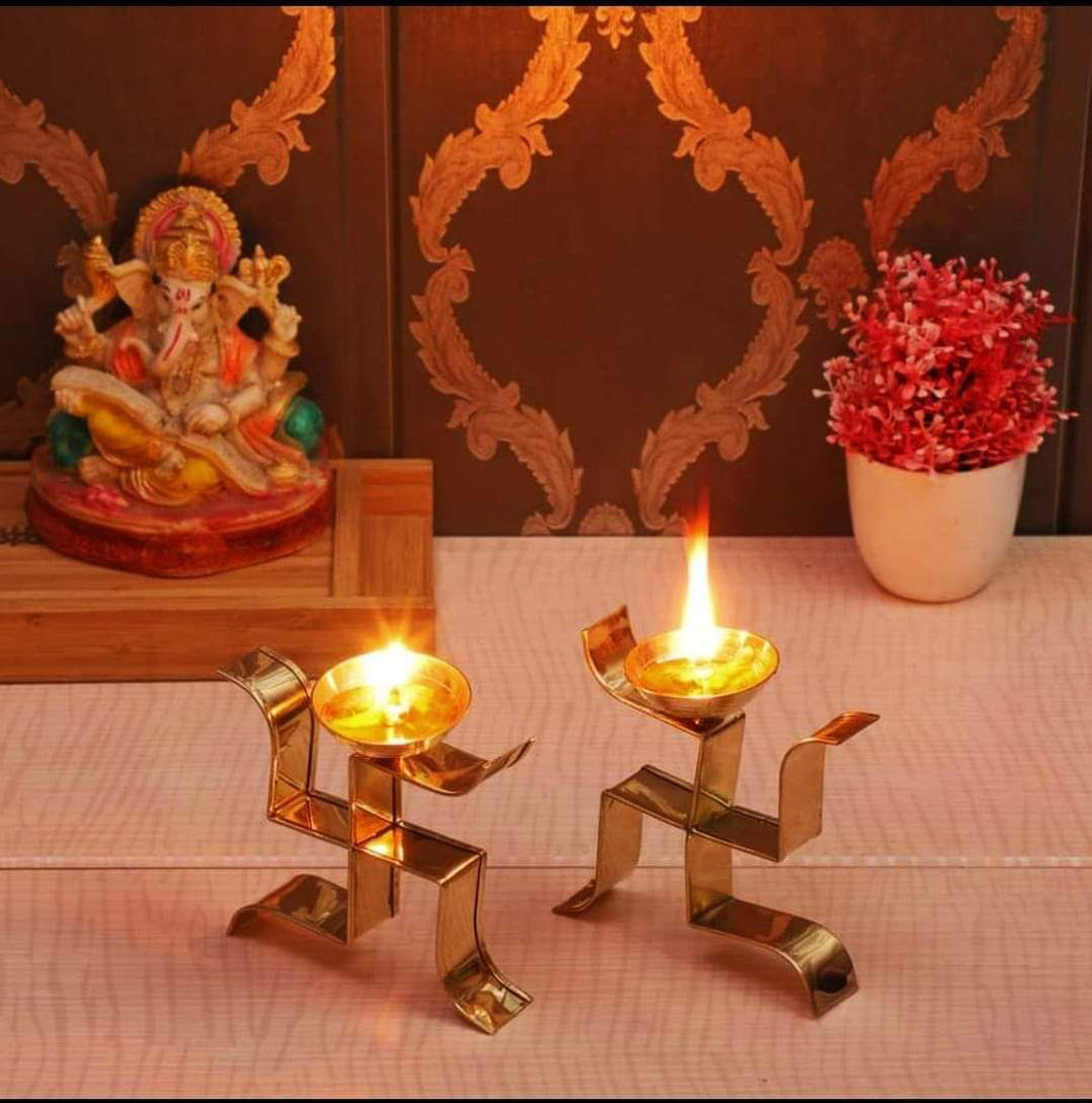 metal swastik Diya