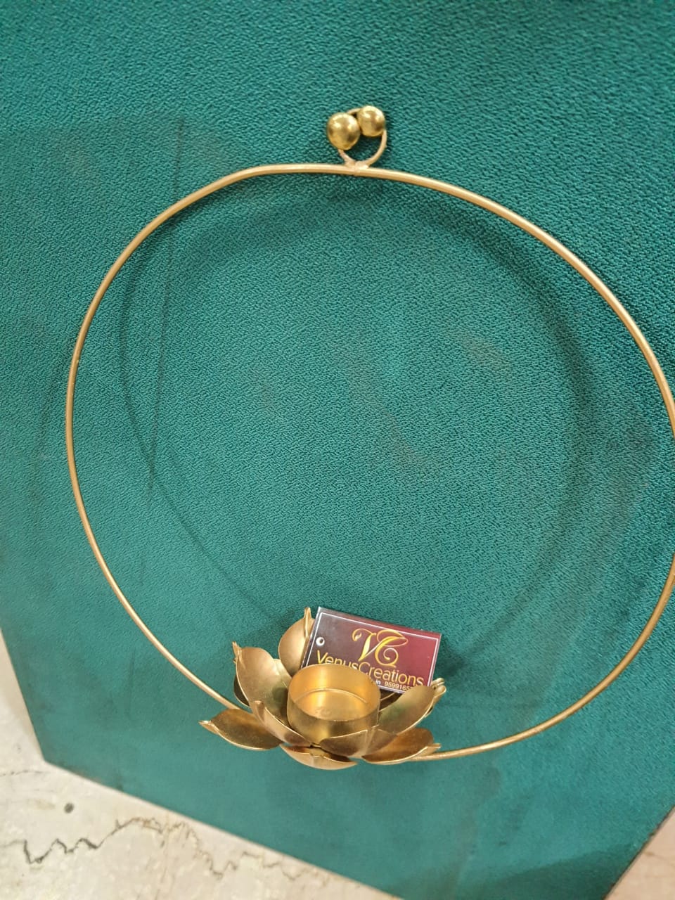 Circular brass T light holder