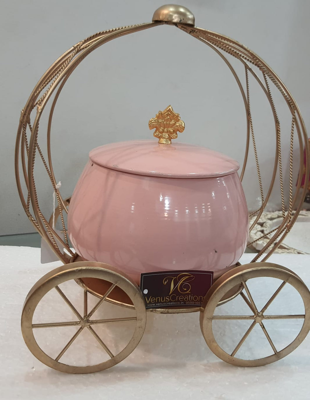 Metal basket with wheels and Pink metal jar for dry fruit / sweets etc